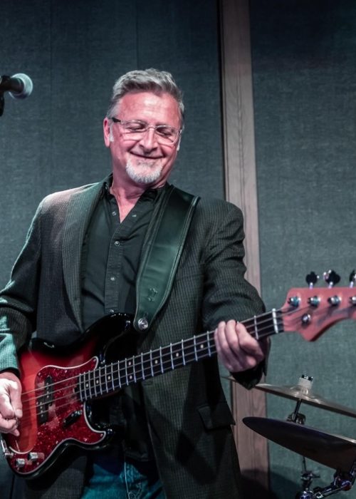 Dave enjoys playing bass
